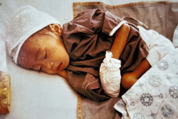 Sick child in hospital bed Qui Nhon during Vietnam War