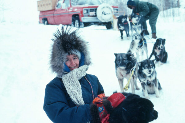 Anne Watts at Eskimo Point Canada with husky dogs